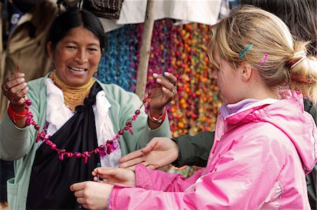 ecuador otavalo market - Girl shopping for necklaces at Otavalo Market, Ecuador Stock Photo - Rights-Managed, Code: 862-06541260