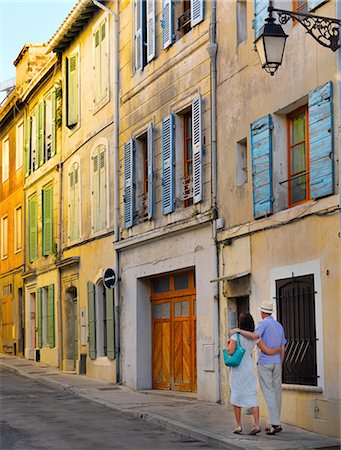 french men - France, Provence, Arles, man and woman walking through oldtown MR Stock Photo - Rights-Managed, Code: 862-06541488