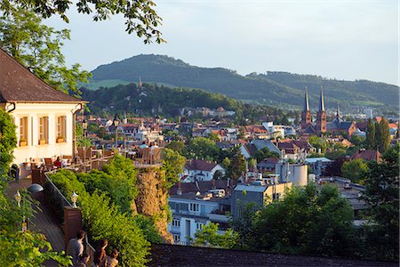 patio restaurant people - Europe, Germany, Freiburg, Baden Wurttemberg, restaurant overlooking town houses Stock Photo - Rights-Managed, Code: 862-06541784