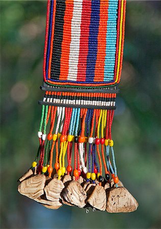 simsearch:862-03888708,k - A beaded neck ornament of a married Pokot woman decorated with tortoise shells. Stock Photo - Rights-Managed, Code: 862-06542263