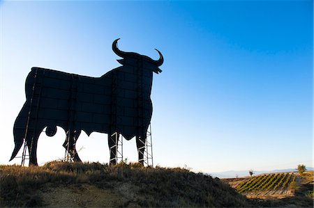 Bull silhouette, classic symbol on the roads of Spain, La Rioja, Spain Stock Photo - Rights-Managed, Code: 862-06542884