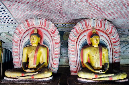 sitting buddha statue - Sri Lanka, North Central Province, Dambulla, Golden Temple, UNESCO World Heritage Site, Royal Rock Temple, Buddha statues in Cave 2 Stock Photo - Rights-Managed, Code: 862-06543017