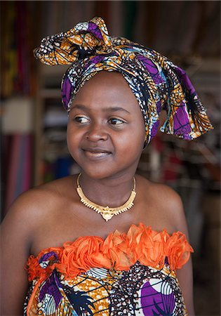 simsearch:862-06543210,k - A well dressed young lady from the Kingdom of Toro wearing an attractive new outfit to attend a wedding, Uganda, Africa Stock Photo - Rights-Managed, Code: 862-06543208