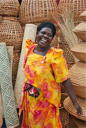 simsearch:862-06543210,k - A happy Muganda woman selling baskets and woven mats at a stall by the side of the road, Uganda, Africa Stock Photo - Rights-Managed, Code: 862-06543302