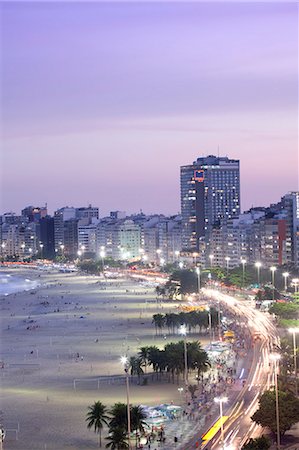 South America, Brazil, Rio de Janeiro, general view of Copacabana Beach at night showing the new beachside cafes, apartment blocks and the Atlantic Avenue Stock Photo - Rights-Managed, Code: 862-06675798