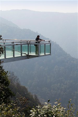 people of the rainforest - China, Yunnan, Xinping. Sky platform in Mount Ailaoshan Nature Reserve near Xinping. Stock Photo - Rights-Managed, Code: 862-06676231