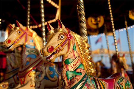 UK, Wiltshire. Beautiful, ornate, traditional pony carousel at an English steamfair. Stock Photo - Rights-Managed, Code: 862-06676687