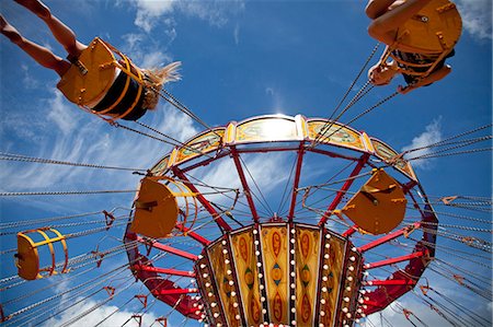 europe theme park - UK, Wiltshire. Children enjoy the chair-O-plane ride at a traditional steamfair. Stock Photo - Rights-Managed, Code: 862-06676682