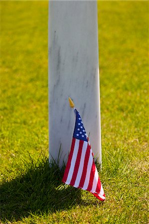 simsearch:862-06676770,k - Memorial grave marker cross and Ameircan Stars and Stripes flag at the Normandy American Cemetery and Memorial, Omaha Beach, Colleville sur Mer, Basse Normandie, France. Stock Photo - Rights-Managed, Code: 862-06676769