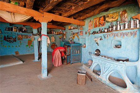 rajasthan village - India, Rajasthan, Rohet. A kitchen in a traditional village house with blue-washed walls and wooden ceiling beams. Stock Photo - Rights-Managed, Code: 862-06676866