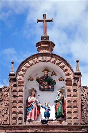 simsearch:862-06677365,k - South America, Peru, Cusco. A representation of the holy family   Mary, Joseph and the Christ child with God the father on the roof of the church of Jesus and Mary on the plaza de armas in the UNESCO World Heritage listed former Inca capital of Cusco Stock Photo - Rights-Managed, Code: 862-06677268