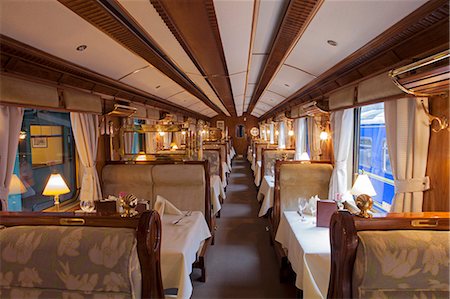 exclusive - South America, Peru, Cusco, Sacred Valley. The dining car with tables set for dinner on the Orient Express Hiram Bingham train which runs between Cusco, Poroy, and Machu Picchu via Ollantaytambo Stock Photo - Rights-Managed, Code: 862-06677262