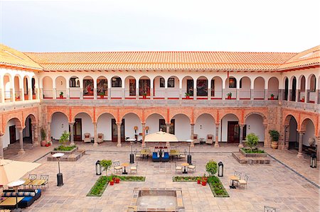 South America, Peru, Cusco, the Marriott hotel, which is housed in a former Spanish convent, showing the view of one of the internal courtyard from a room in the colonial cloisters Stock Photo - Rights-Managed, Code: 862-06677329