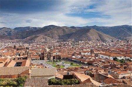 simsearch:862-06677365,k - South America, Peru, Cusco. A view of Cusco from Sacsayhuaman showing the Plaza de Armas with the cathedral to the left, the Jesuit church of the Company of Jesus, Compania de Jesus, in the middle and the church of La Merced to the right of shot in the UNESCO World Heritage listed former Inca capital of Cusco Stock Photo - Rights-Managed, Code: 862-06677342