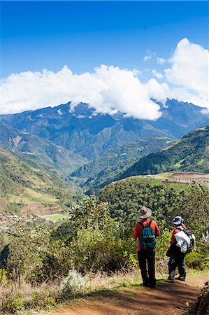 simsearch:862-06677365,k - South America, Peru, Cusco, Huancacalle. Hikers approaching the Inca ceremonial and sacred site of Vitcos, thought to have been built by Manco Inca or Pachacuti and lying on the trail to Choquequirao near the village of Huancacalle Stock Photo - Rights-Managed, Code: 862-06677379