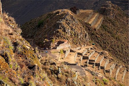 simsearch:862-06677365,k - South America, Peru, Cusco, Sacred Valley, Pisac. View of the Sacred Valley from Pisac with hikers walking around the Inca buildings and terraces Stock Photo - Rights-Managed, Code: 862-06677370