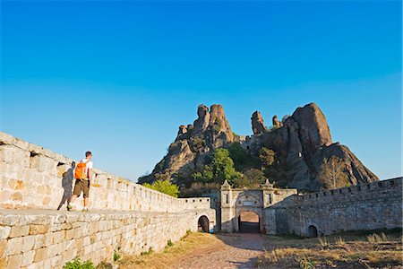 simsearch:862-06825141,k - Europe, Bulgaria, Belogradchik, hiker at Kaleto Rock Fortress (MR) Stock Photo - Rights-Managed, Code: 862-06824980