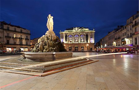 dusk - The Place de la Comedie is the main focal point of the city of Montpellier, in the Herault departement in southern France. Stock Photo - Rights-Managed, Code: 862-06825481