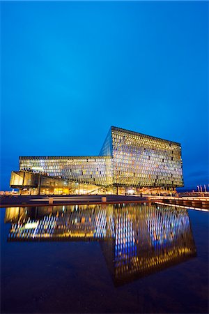 Iceland, Reykjavik, Harpa Concert Hall and Conference Center, the glass facade was designed by Olafur Eliasson and Henning. Stock Photo - Rights-Managed, Code: 862-06825634