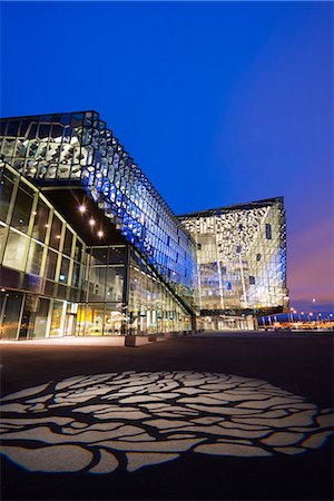 Iceland, Reykjavik, Harpa Concert Hall and Conference Center, the glass facade was designed by Olafur Eliasson and Henning. Stock Photo - Rights-Managed, Code: 862-06825637