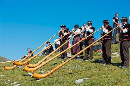 people playing musical instruments - Europe, Swiss Alps, Switzerland, Bernese Oberland, Swiss Alps Jungfrau-Aletsch, Unesco World Heritage site, Jungfrau marathon, Swiss horn players Stock Photo - Rights-Managed, Code: 862-06826255