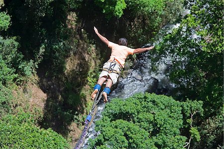 Bungee jumper,  San Jose, Costa Rica Stock Photo - Rights-Managed, Code: 862-07495882