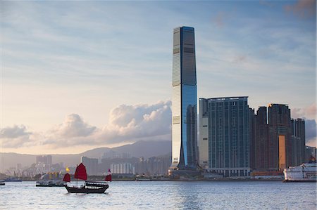 simsearch:862-05997261,k - Junk boat passing International Commerce Centre (ICC), West Kowloon, Hong Kong Stock Photo - Rights-Managed, Code: 862-07909499