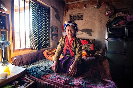 simsearch:841-08102090,k - Myanmar, Shan state, Hsipaw. Burmese woman of shan ethnicity inside a typical house (MR) (PR) Stock Photo - Rights-Managed, Code: 862-07910344