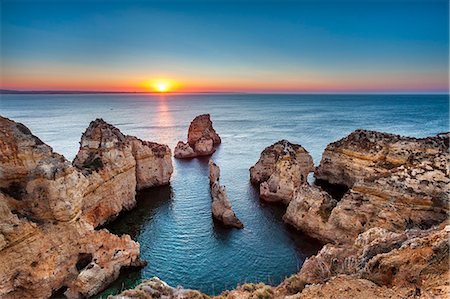 Sunrise, Ponta de Piedade, Lagos, Algarve, Portugal Stock Photo - Rights-Managed, Code: 862-07910596