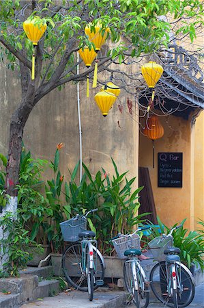Bicycles outside bar, Hoi An (UNESCO World Heritage Site), Quang Ham, Vietnam Stock Photo - Rights-Managed, Code: 862-07911084