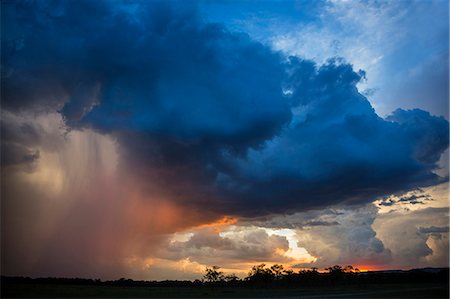 Africa, Kenya, Narok County, Masai Mara National Reserve. Stormy skys across the mara. Stock Photo - Rights-Managed, Code: 862-08090815