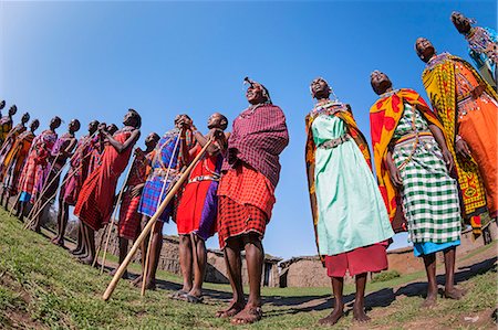 Africa, Kenya, Narok County, Masai Mara. Masai men and women dancing at their homestead. Stock Photo - Rights-Managed, Code: 862-08090824