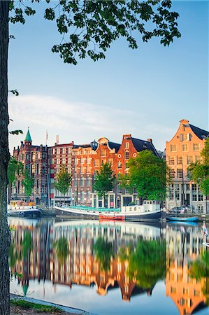 simsearch:862-07690164,k - Netherlands, North Holland, Amsterdam. Typical houses and houseboats on Amstel river. Stock Photo - Rights-Managed, Code: 862-08090972
