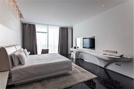 simsearch:862-07690507,k - Bedroom suite in the 5 star Yas Viceroy Hotel, Yas West designed by Asymptote Architecture, Abu Dhabi, United Arab Emirates. Photographie de stock - Rights-Managed, Code: 862-08091337