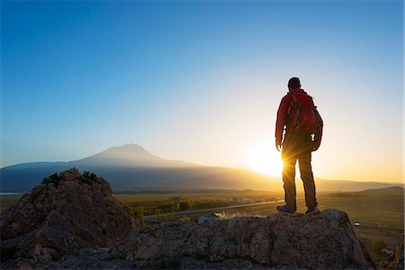 silhouette of man standing in a mountain top - Turkey, Eastern Anatolia, Dogubayazit, Mt Ararat (5137m), sunrise Stock Photo - Rights-Managed, Code: 862-08274033