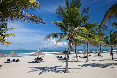 Vietnam, Quang Nam Province, Hoi An. The beach at a boutique resort Stock Photo - Rights-Managed, Code: 862-08274135