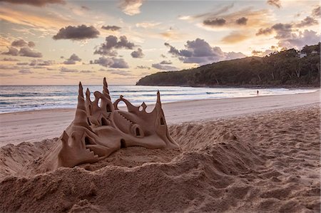 Sandcastle on Noosa Beach and the Tasman Sea at sunrise, Noosa Heads, Queensland, Australia. Stock Photo - Rights-Managed, Code: 862-08272918