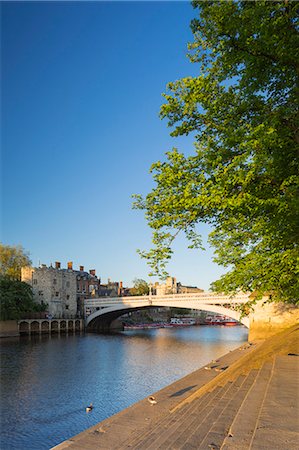 United Kingdom, England, North Yorkshire, York. Mid summer evening light on Lendal Bridge and the River Ouse. Stock Photo - Rights-Managed, Code: 862-08273062