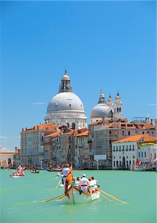 Italy, Veneto, Venice. During the Vongalonga rowing boats in front of the Santa Maria della Salute Church on the Gran Canal. Stock Photo - Rights-Managed, Code: 862-08273397