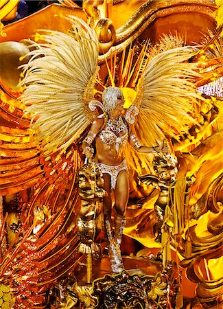 rio carnival dancing people - Brazil, State of Rio de Janeiro, City of Rio de Janeiro, Samba Dancer in the Carnival Parade at The Sambadrome Marques de Sapucai. Stock Photo - Rights-Managed, Code: 862-08698733