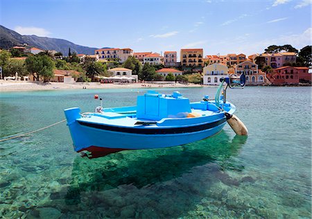 Greece, Kefalonia, Assos. A small fishing boat in the harbour. Photographie de stock - Rights-Managed, Code: 862-08699287