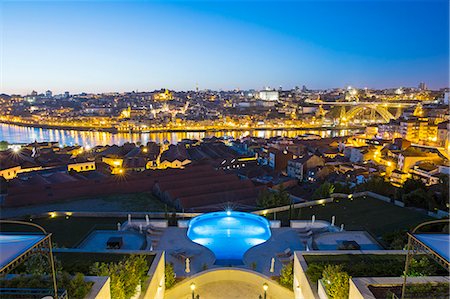simsearch:862-07690507,k - Portugal, Douro Litoral, Porto. Dusk view towards the old town of Porto and the Ribeira district from The Yeatman Hotel in Vila Nova De Gaia. Photographie de stock - Rights-Managed, Code: 862-08699749