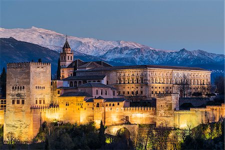 spain tourist attraction - View at dusk of Alhambra palace with the snowy Sierra Nevada in the background, Granada, Andalusia, Spain Stock Photo - Rights-Managed, Code: 862-08700055