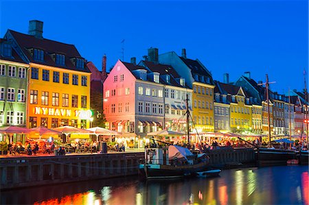 Denmark, Hillerod, Copenhagen. Colourful buildings along the 17th century waterfront of Nyhavn at dusk. Stock Photo - Rights-Managed, Code: 862-08718565