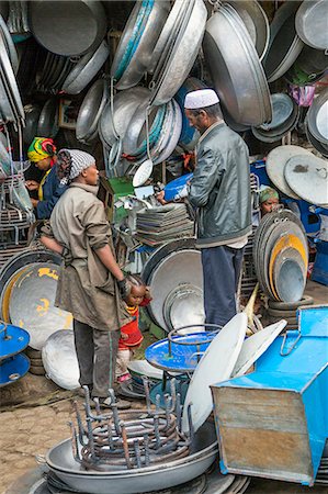 simsearch:862-06543210,k - Ethiopia, Addis Ababa, Mercato.  A roadside stall in the sprawling Mercato market displays pots, trays and pans made from recycled material. Almost every conceivable old or discarded item is recycled there. Stock Photo - Rights-Managed, Code: 862-08718720