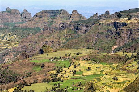 Ethiopia, Amhara Region, Simien Mountains, Simien Mountain National Park, Debark. Two waterfalls tumble down an escarpment in this spectacular view of the Simien Mountains which rise to 4550m above sea level. Stock Photo - Rights-Managed, Code: 862-08718787