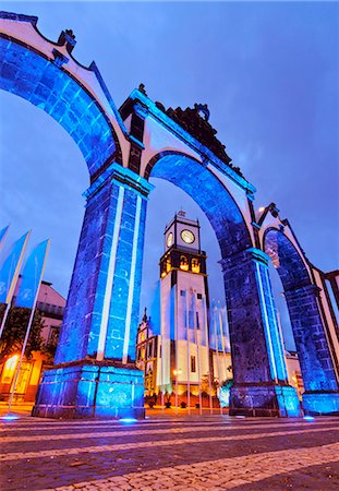 simsearch:862-03889206,k - Portugal, Azores, Sao Miguel, Ponta Delgada, Twilight view of Main Church Igreja Martiz through Town Gates Portas da Cidade. Stock Photo - Rights-Managed, Code: 862-08719368