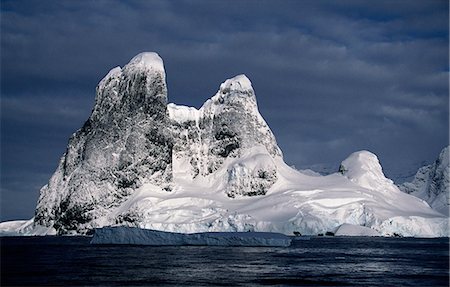 Twin peaks of Cape Renard at northern entrance Stock Photo - Rights-Managed, Code: 862-03288403