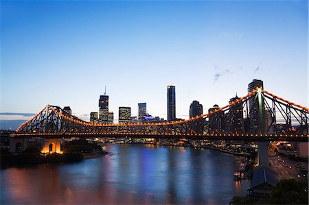 The Brisbane city skyline at dusk,with the Story Bridge illuminated over the Brisbane River. Stock Photo - Rights-Managed, Code: 862-03288674