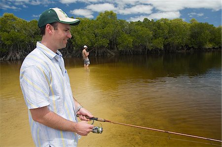 fraser river - Fishermen try their luck in the mangrove waterways of Coongul Creek on the west coast of Fraser Island. Stock Photo - Rights-Managed, Code: 862-03288736